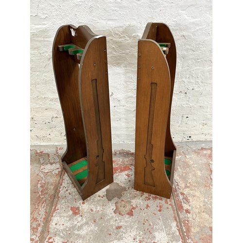 147 - A pair of wooden and green felt three section rifle stands - approx. 94cm high