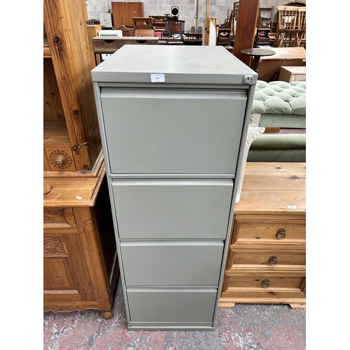 204 - A Triumph grey metal four drawer office filing cabinet