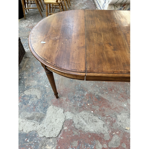 226 - A Simpson's of Norfolk cherry wood extending dining table