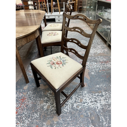 245 - A Georgian mahogany D end extending dining table and eight matching chairs