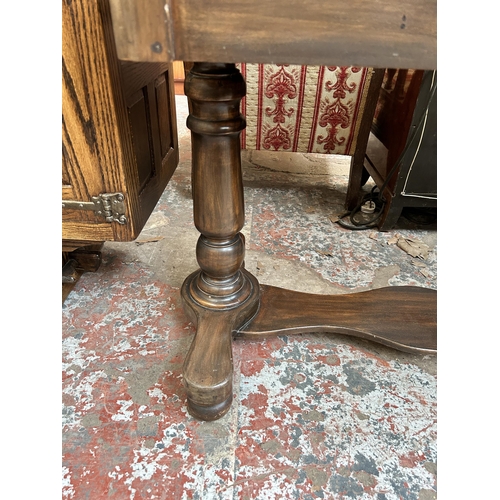 34 - A Victorian mahogany wash stand with galleried back and single drawer
