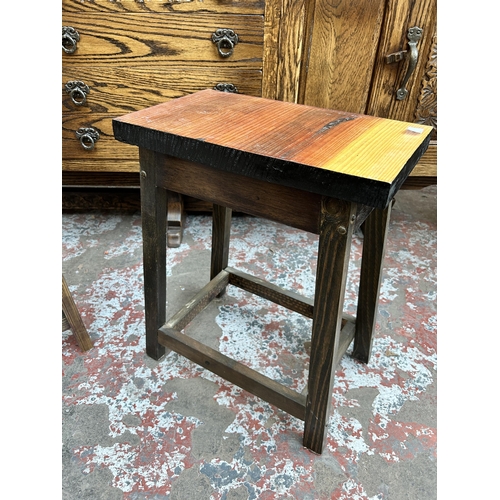35 - A pair of stained pine farmhouse type stools
