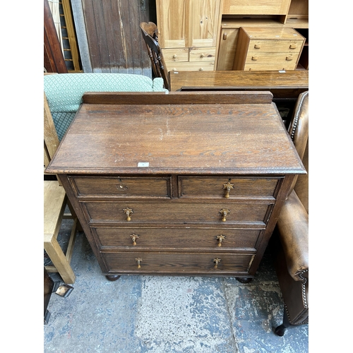 41 - A 1930s oak chest of two short over three long drawers