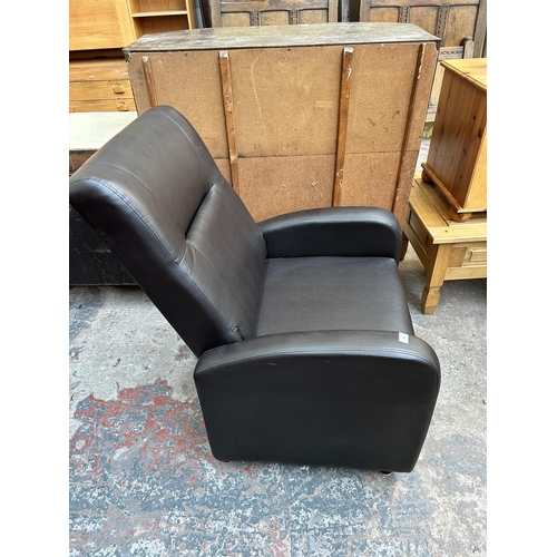 45 - A Hute Wohnen brown leatherette reclining armchair
