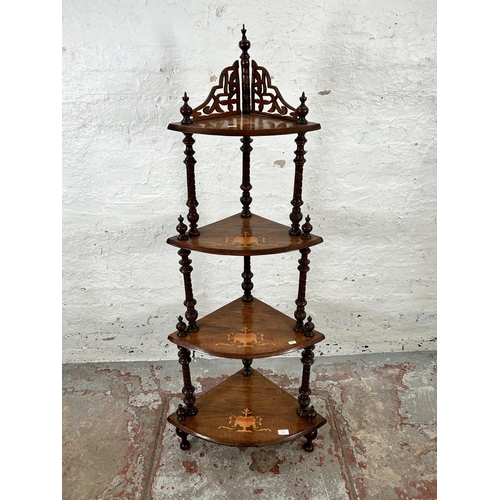 55 - A Victorian inlaid walnut four tier whatnot stand