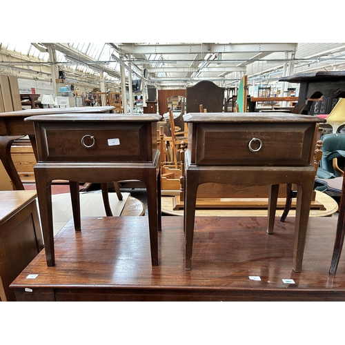 63 - A pair of Stag Minstrel mahogany bedside tables