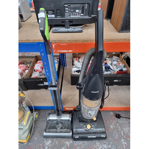 862 - Two upright bagless vacuum cleaners, one Samsung 1800w and one Gtech AirRAM