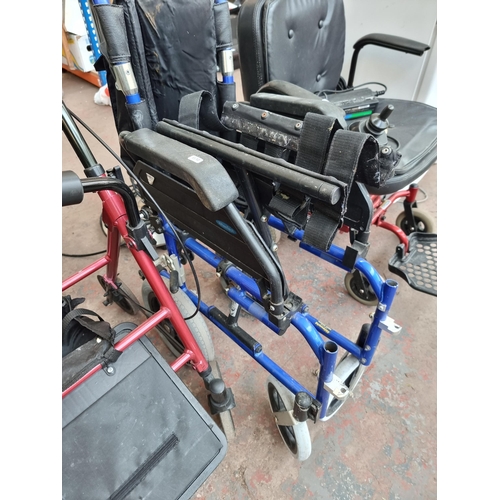 877 - Three mobility items, one Sunrise medical folding wheelchair, one Drive four wheeled walking frame a... 