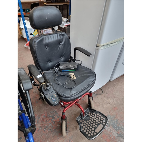 878 - A Rascal electric wheelchair with charger