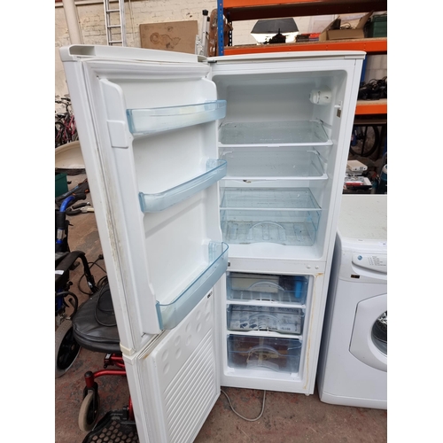 879 - An Iceking upright fridge freezer - approx. 146cm high