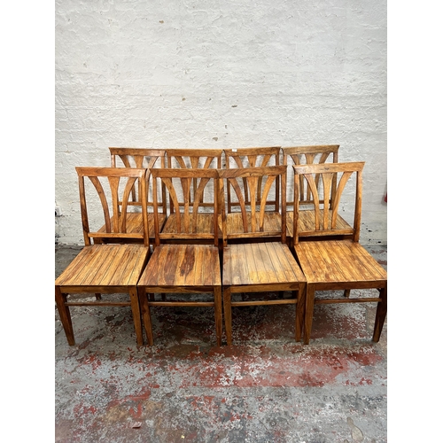 107 - Eight Indian sheesham wood dining chairs