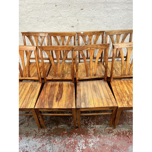 107 - Eight Indian sheesham wood dining chairs