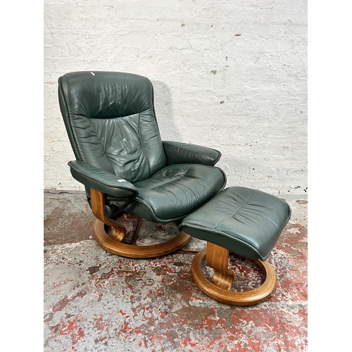 109 - An Ekornes Stressless green leather and bentwood reclining armchair and footstool