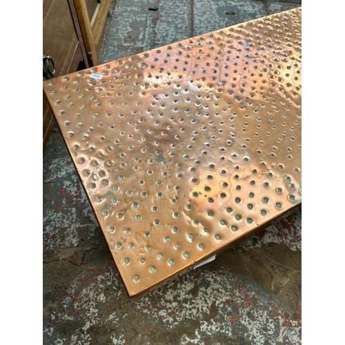 123 - A Wendron Forge copper topped and oak rectangular coffee table