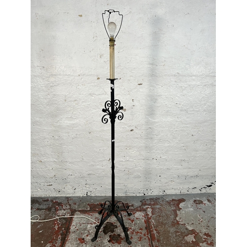 172 - A Victorian style wrought iron standard lamp - approx. 175cm high