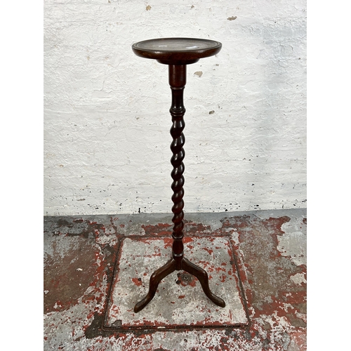 173 - An oak barley twist jardinière stand with circular top and tripod pedestal support - approx. 125cm h... 