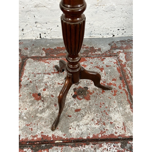 174 - A 19th century style mahogany jardinière stand with circular top and tripod pedestal support - appro... 