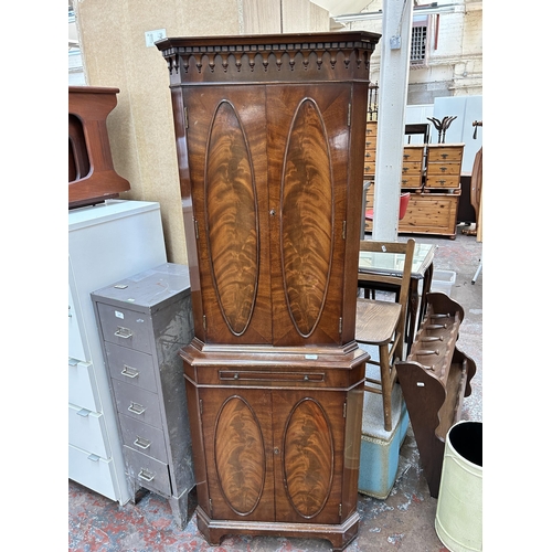 182 - A Burton Reproductions Ltd. Georgian style mahogany free standing corner cabinet