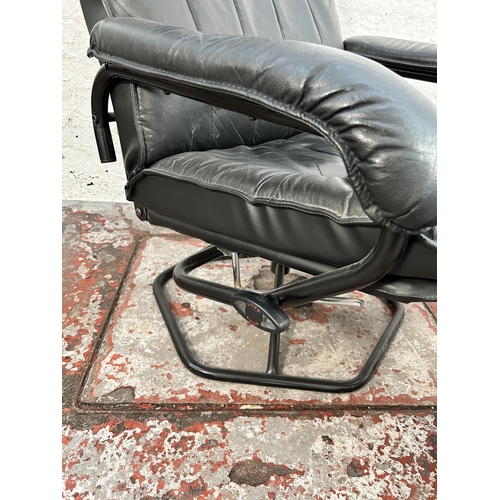 184 - A Danish Unico black leather swivel armchair and footstool