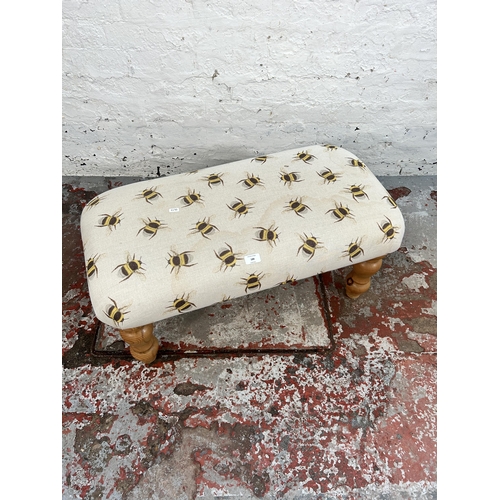 188 - A modern fabric upholstered and pine footstool