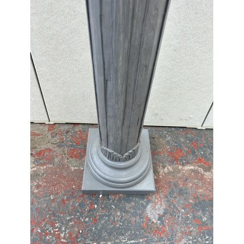 196 - A grey painted corinthian column jardinière stand - approx. 117cm high