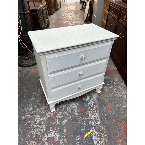 218 - A modern white painted chest of three drawers