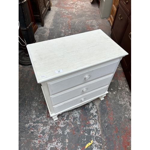 218 - A modern white painted chest of three drawers