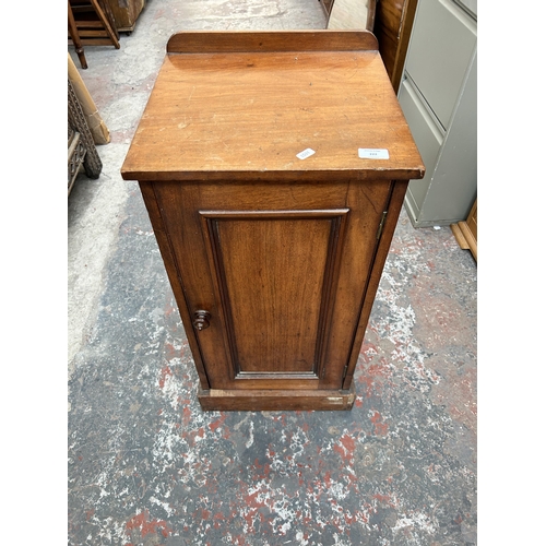 222 - A late 19th/early 20th century mahogany bedside cabinet