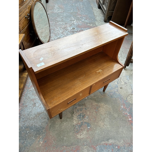 229 - A mid 20th century teak side cabinet with two drawers