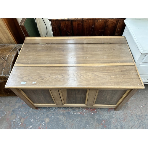 231 - A 19th century style beech three panel blanket box