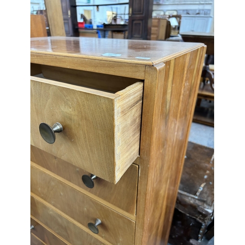 237 - A mid 20th century walnut chest of six drawers