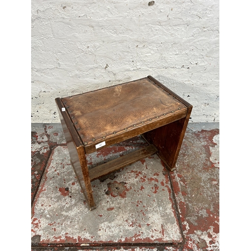 241 - An Art Deco beech and brown leather dressing table stool