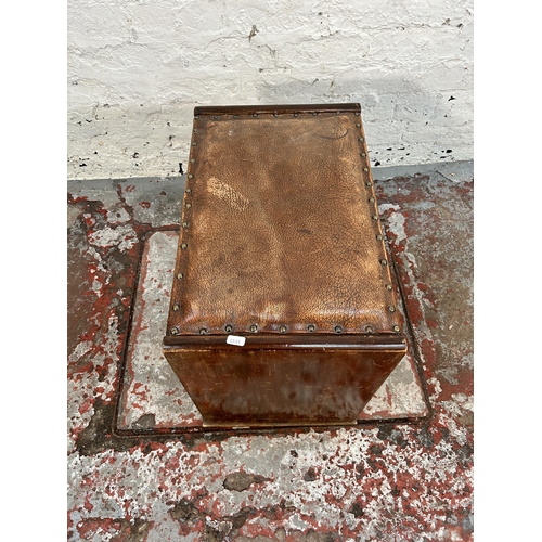 241 - An Art Deco beech and brown leather dressing table stool