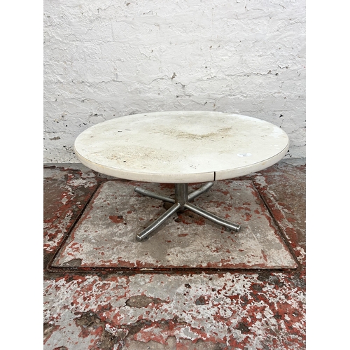 244 - A 1960s white laminate and chrome plated circular occasional table