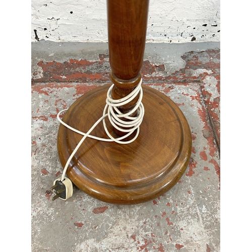 244A - A beech standard lamp - approx. 172cm high