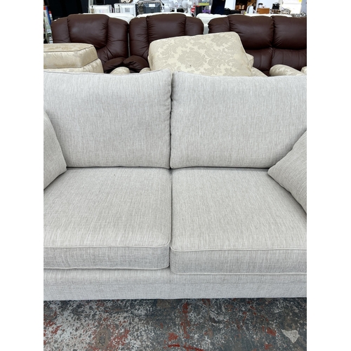 247 - A modern fabric upholstered three seater sofa - approx. 93cm high x 200cm wide x 95cm deep