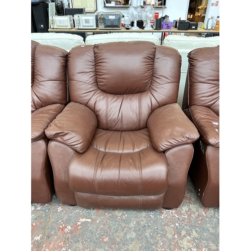 249 - A brown leather three piece lounge suite comprising reclining three seater sofa, electric reclining ... 