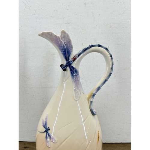 321 - A Franz Dragonfly jug by Jen Woo - approx. 32cm high