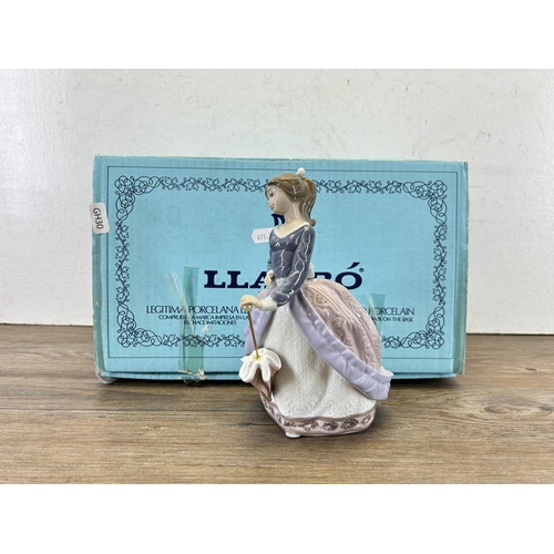 322 - A boxed Lladro 'Evita' figurine - model no. 5212