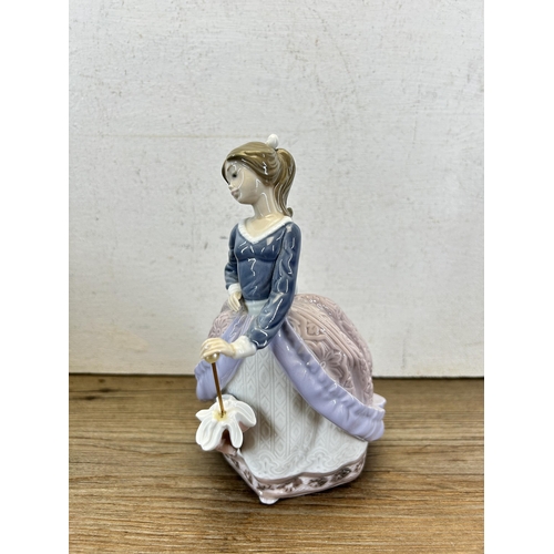 322 - A boxed Lladro 'Evita' figurine - model no. 5212