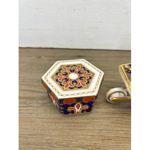 332 - Two pieces of Royal Crown Derby Old Imari bone china, one A1297 trinket box and one miniature wheel ... 