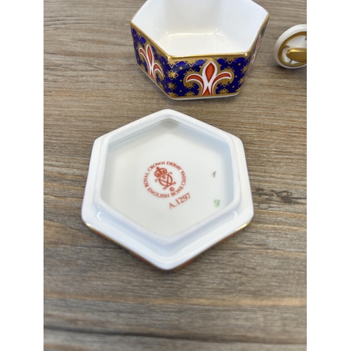 332 - Two pieces of Royal Crown Derby Old Imari bone china, one A1297 trinket box and one miniature wheel ... 