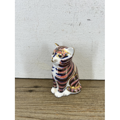 335 - A Royal Crown Derby cat paperweight with gold stopper - approx. 8cm high