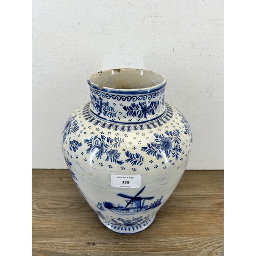 338 - A 19th century Delft blue and white vase - approx. 28cm high