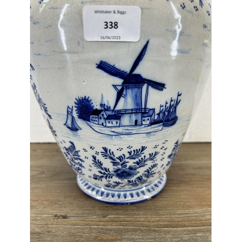 338 - A 19th century Delft blue and white vase - approx. 28cm high