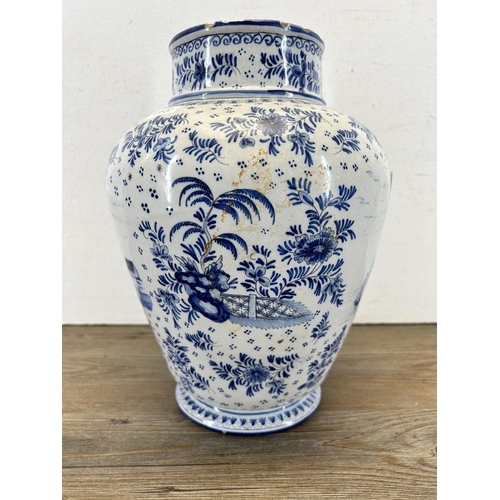 338 - A 19th century Delft blue and white vase - approx. 28cm high