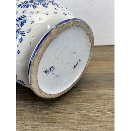 338 - A 19th century Delft blue and white vase - approx. 28cm high