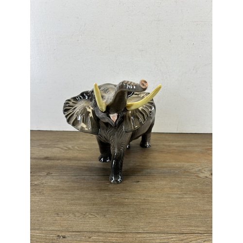 341 - Two Beswick elephant figurines - largest approx. 26cm high x 33cm long