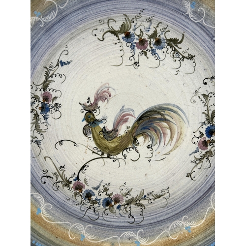 347 - A hand painted ceramic wall charger depicting cockerel signed to reverse - approx. 28cm diameter