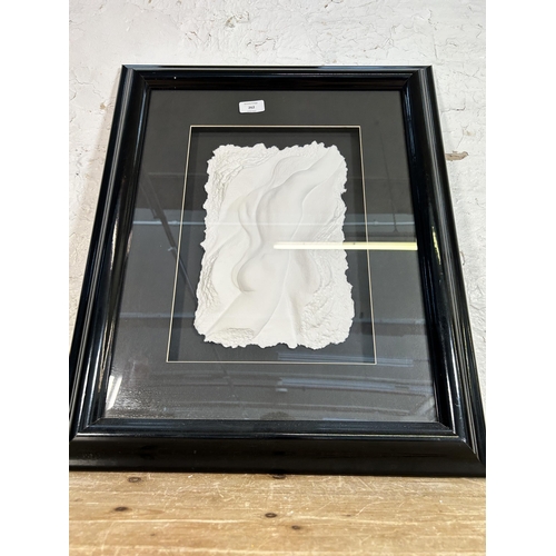 262 - A framed Roberta Peck pencil signed nude man cast paper relief - approx. 60cm high x 51cm wide